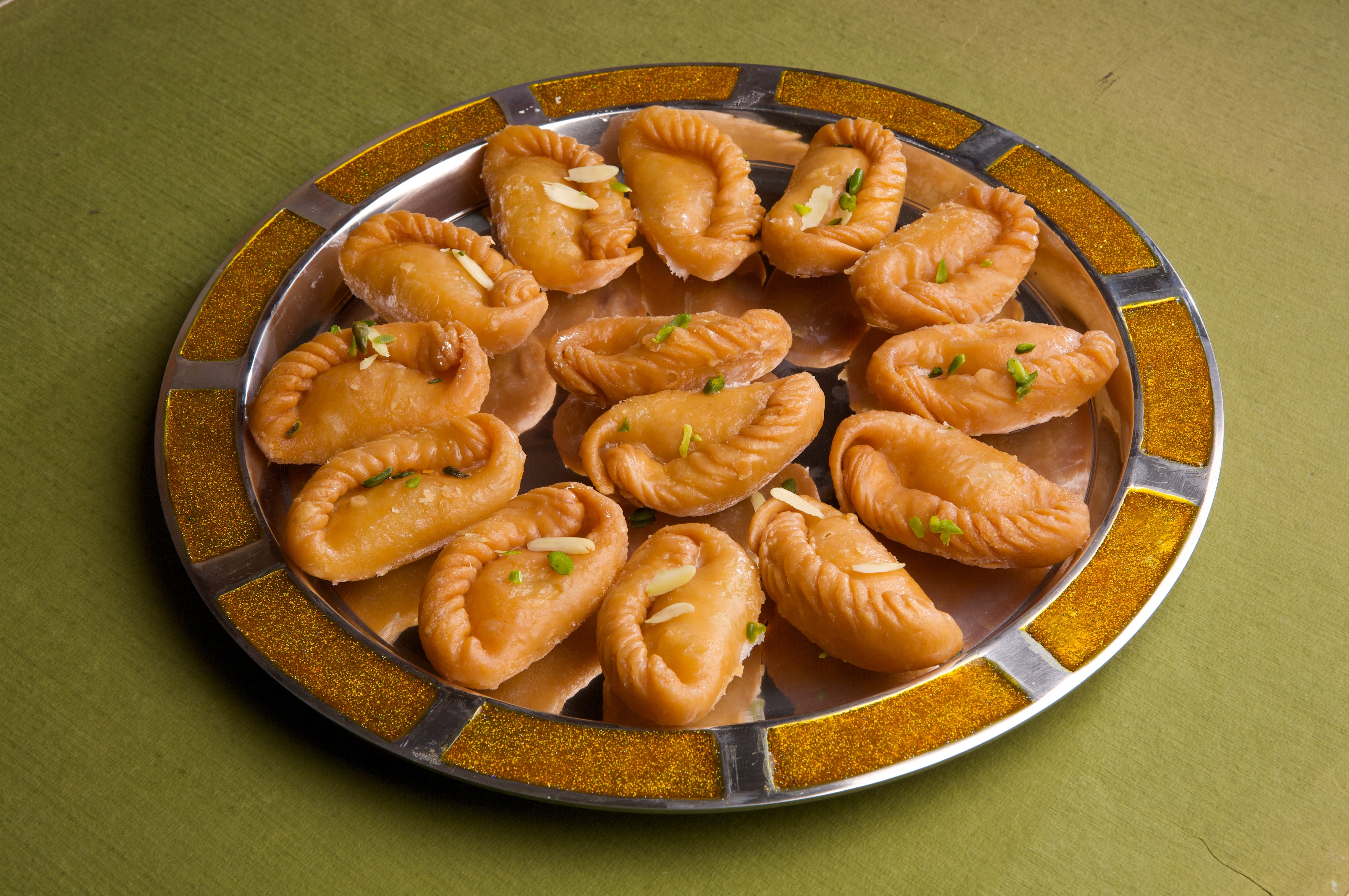 Forgotten Savour Of Homemade Delights : Gujiyas And Mathhis.