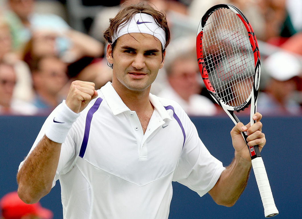 Federer plays it cool in first round win at Australian Open